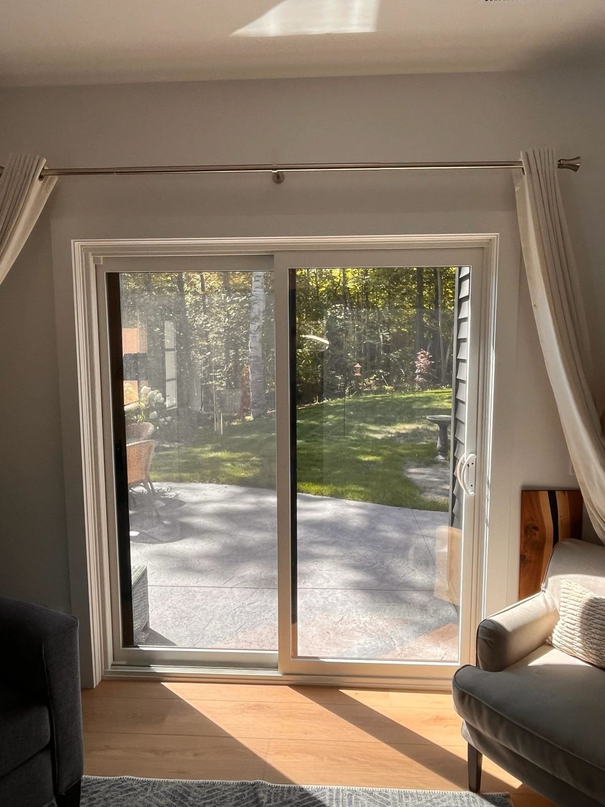 Patio sliding door with window film overlooking a garden